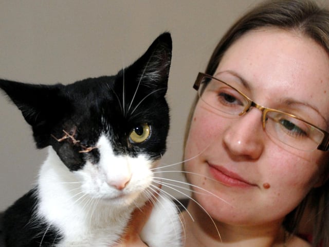 In 2009, another poor cat was shot. Here is Gemma Williams with her cat Pepper.