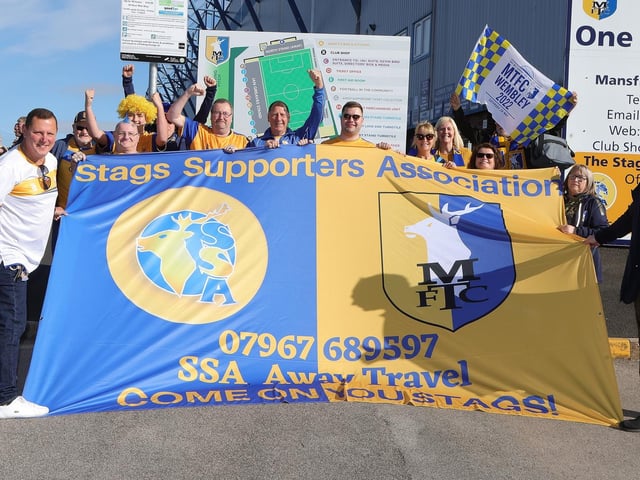 The SSA supportes await the buses.