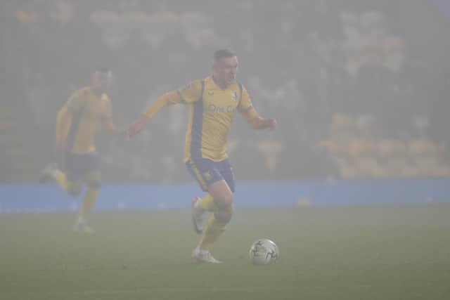 George Maris attacks as the fog gathers during Stags' Carabao Cup match against Port Vale FC at the One Call Stadium, 30 Oct 2023  
Photo credit : Chris & Jeanette Holloway / The Bigger Picture.media