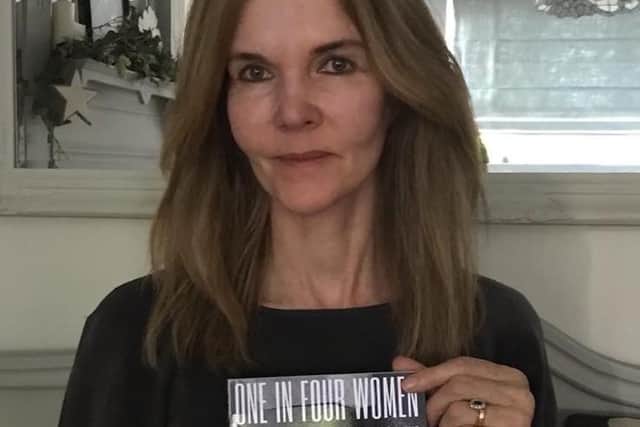 Charity worker Sandra Reddish with her new book 'One in Four Women'.