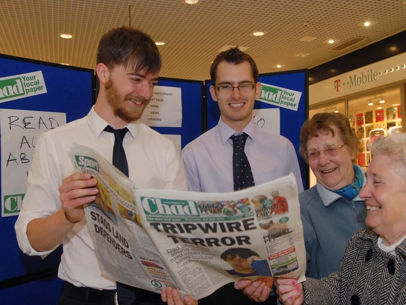 Former Chad reporters Adam Raistrick and James Hoy talked to shoppers Connie Bewick and Kathleen Smith at a Chad road show in the Four Seasons shopping centre. 2010.