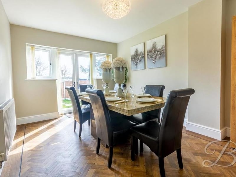 The dining room is a beautiful space, with French doors leading out to the back garden. It is a splendid spot for family meals or for entertaining friends.