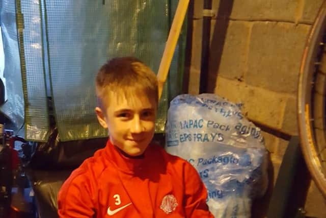 Josh Poxon, aged 13, "rows" the channel.