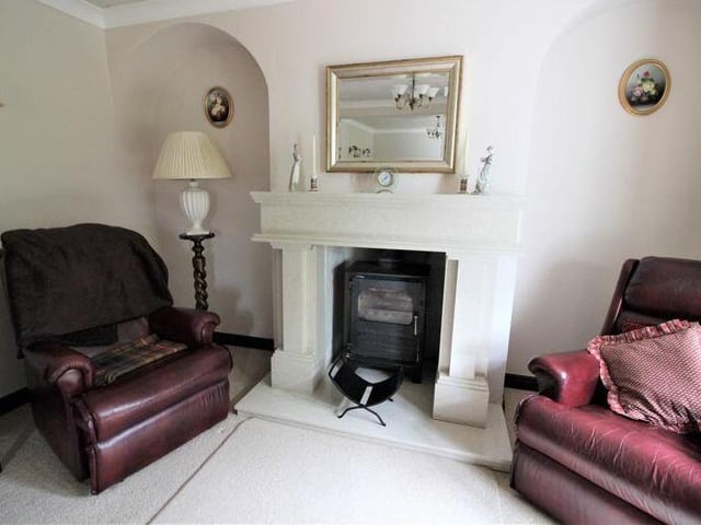 A closer look at the marble fireplace in the lounge, which is the main reception room on the ground floor.