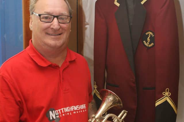 Volunteer, David Whitchurch, with a Cornet belonging to Roy Turton Laycock and a uniform from Whitwell Brass Band.
