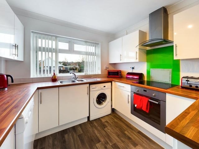 Moving now into the modern, fitted kitchen at the £240,000 bungalow. Smart and stylish are the words that spring to mind.