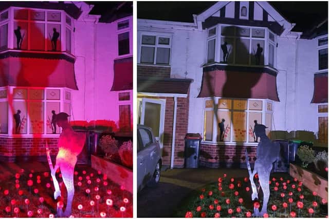 Ian Butler and his partner Chelsea Coulson decorated their house in tribute to fallen soldiers