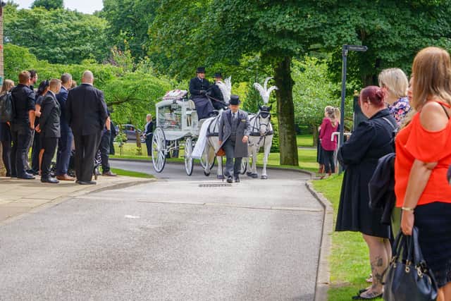The horse-drawn carriage bearing Katrina's coffin arrives at the Thoresby Chapel at Mansfield & District Crematorium. (Photo by: Brian Eyre/nationalworld.com)
