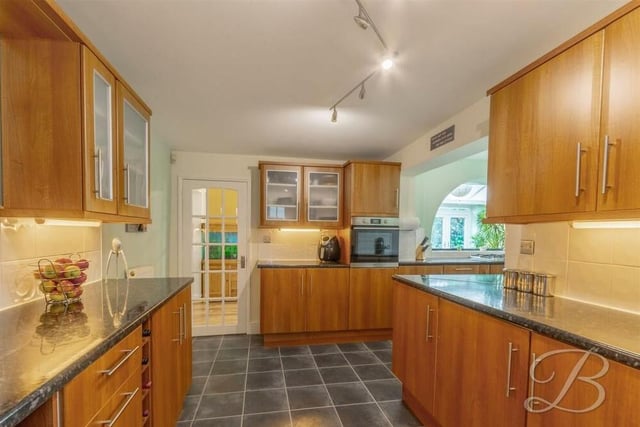 The kitchen features matching wall and base units and cabinets, and an excellent amount of worktop space to showcase your culinary skills. Integrated appliances include an oven and a dishwasher.