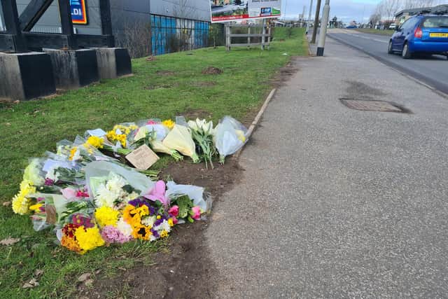 Floral tributes were left at the scene.
