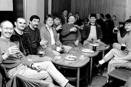 Mansfield Colliery, March 1988. Miners have a drink in the welfare after their last shift.