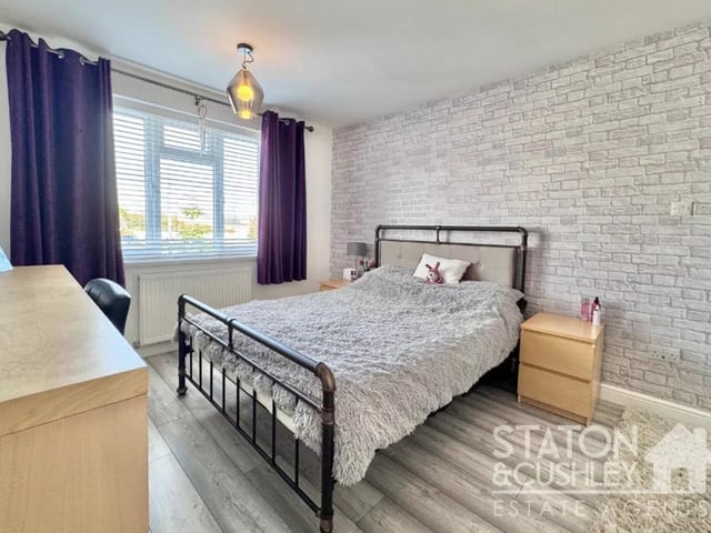 One of four double bedrooms in this spacious property.