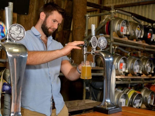 Even organiser Troy Whyte gets behind the bar at the Beauvale Priory Beer Festival in 2019.