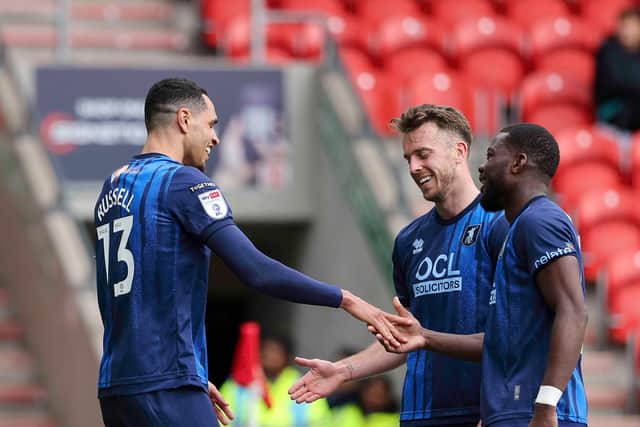 Jon Russell and Rhys Oates celebrate during the Sky Bet League One match against Doncaster Rovers FC at the Eco-Power Stadium, 03 April 2026.  Photo Chris &  Jeanette Holloway / The Bigger Picture.media