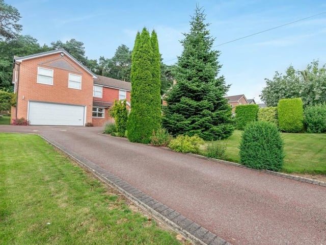 The driveway also leads to this integral double garage, which has a remote-controlled, electric up-and-over door.