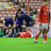 Three players are hurt after the challenge that saw Stags level during the Sky Bet League 2 match against Barnsley FC at the Oakwell Stadium, 26 December 2025. Photo Chris & Jeanette Holloway / The Bigger Picture.media