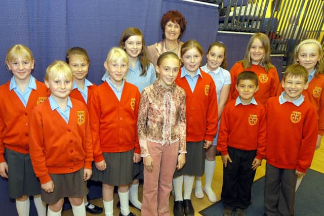 Adjudicator Marie Dixon pictured with youngsters who took part in one of the classes at the music and drama festival in 2007.