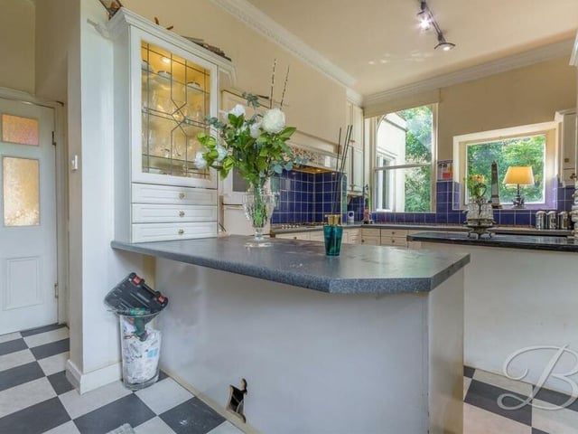 As well as plenty of appliances, the kitchen comes with a walk-in pantry and a handy utility room that has space for additional features and storage.