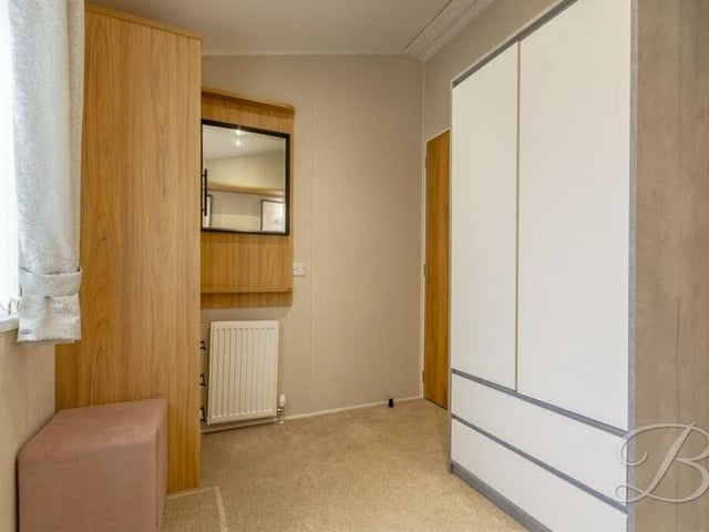 Built-in wardrobes are a wonderful feature of both the main bedrooms. Here's what they look like in number two.