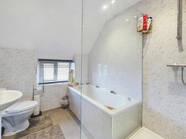 There are two modern bathrooms on the first floor of the Kingsway property, including this one,