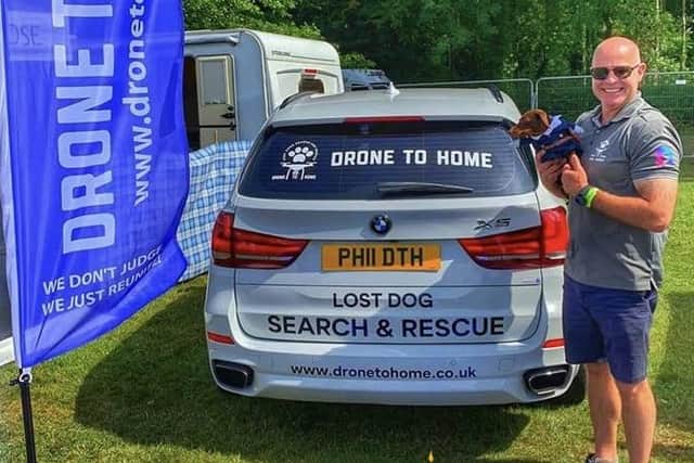 Drone to Home charity founder Phil James with his search and rescue vehicle.