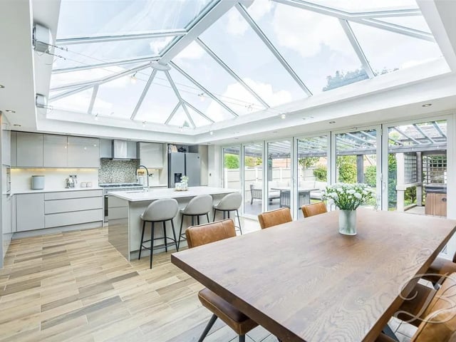 The well-appointed open plan kitchen/diner is complete with modern appliances and ample storage.