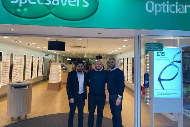 New Sutton Specsavers directors Irfan Mkda (left) and Sunny Boyal (right) with current director Michael Hinder. Photo: Submitted
