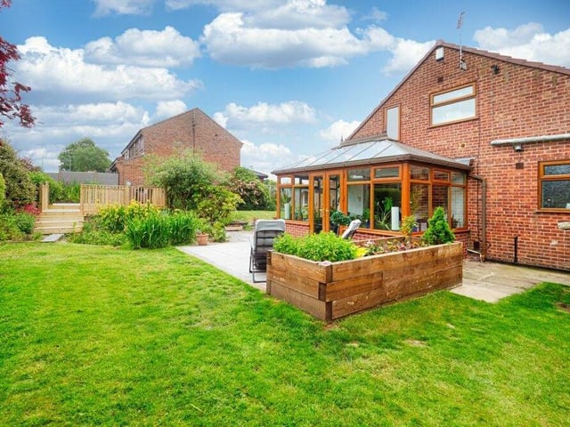 A pleasant patio area outside the entertainment room is another attractive aspect of the garden.