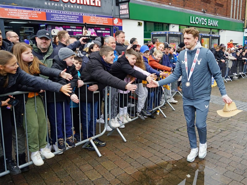 Crowds packed into Mansfield town centre this afternoon to salute their heroes.