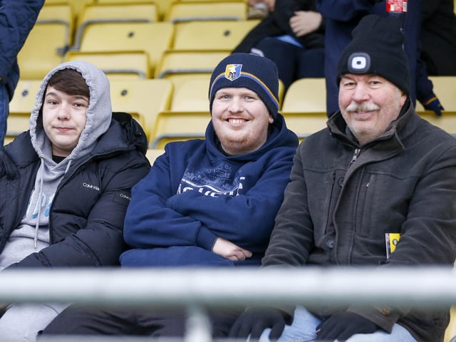 Mansfield fans at The EnviroVent Stadium for the match against Harrogate Town.