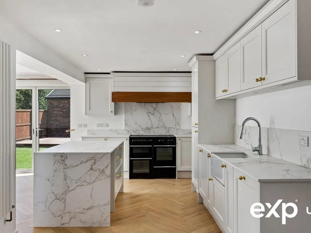 The stunning, recently extended triple-aspect open-plan kitchen, dining and living space.