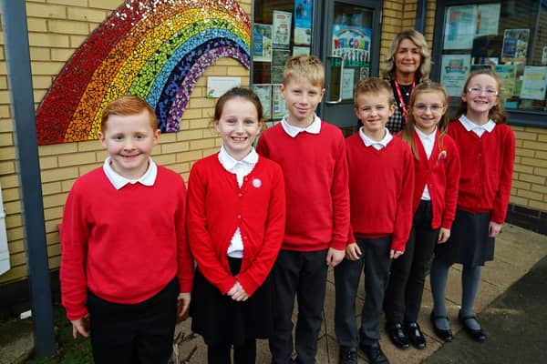 Farmilo Primary School pupils celebrate their good Ofsted report with headteacher Suzanne Tryner.