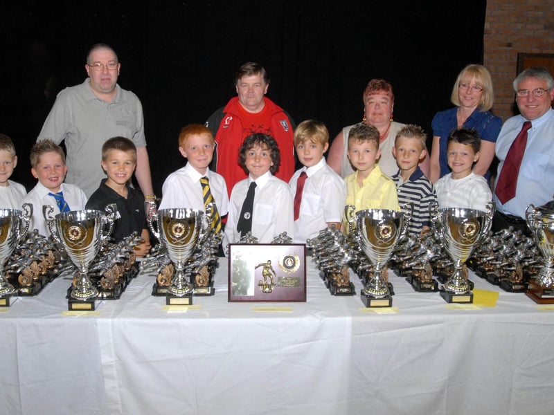 A presentation night was held at the Festival Hall Kirkby in 2008 for the Chad Youth League . Pic shows captains and committee members.