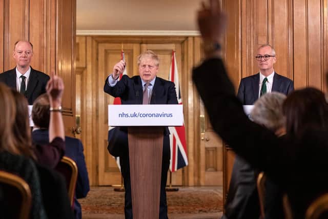 Prime Minister Boris Johnson gives a press conference on the ongoing situation with the coronavirus pandemic with chief medical officer Chris Whitty and Chief scientific officer Sir Patrick Vallance (Photo by Richard Pohle - WPA Pool/Getty Images)