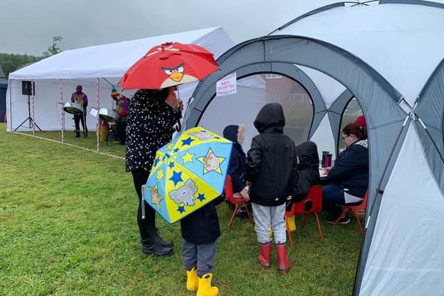 Residents did not let the rain stop their community event.