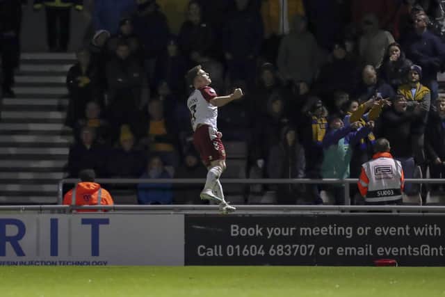 Sam Hoskins celebrates his penalty success. Photo by Chris & Jeanette Holloway/The Bigger Picture.media