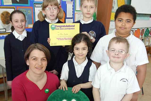 2006: Emma Grishon from the NSPCC thanks Kimberley Primary School pupils for raising £1058.75 from a sponsored spell.