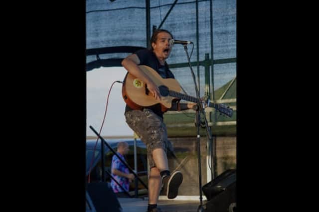 Warren Ireland pictured on stage.