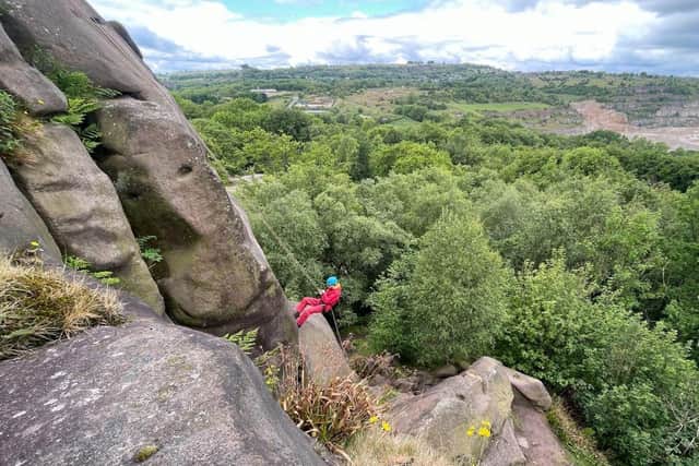 Young person abseiling on Team programme residential trip
