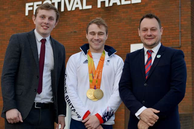 Coun Tom Hollis (left) on a council engagement with Coun Jason Zadrozny and Paralympic gold medallist, Ollie Hynd (centre)