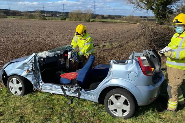 Emergency workers were called to a collision involving three cars.