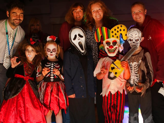 Bramble Academy fundraiser for the playground, pictured are the organisers and some of the youngsters at the Halloween disco