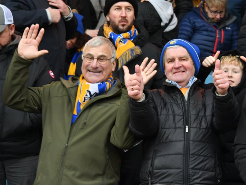 Mansfield Town fans watch the brilliant win at Peterborough United.