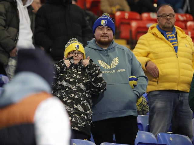 Mansfield Town conceded three times in the final 15 minutes to lose at Bolton Wanderers.