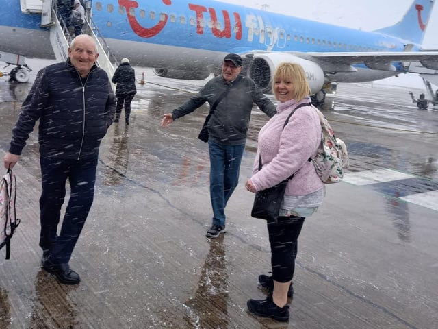 Flight delays for Angela Ball from Mansfield, as snow touches down at East Midlands Airport.