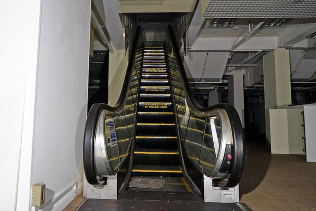 The escalators have fallen still now shoppers have gone.