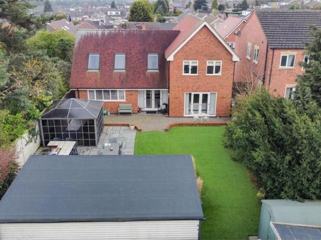 The final photo in our gallery shows a view from the skies of the back of the Forest Town property.