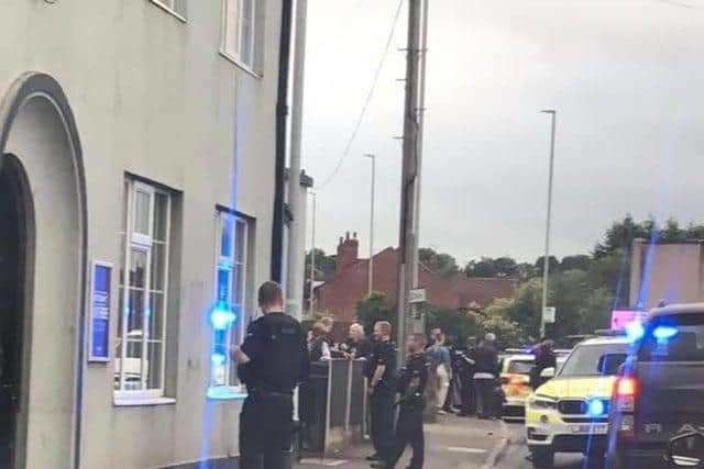 Police outside the Jug and Glass pub