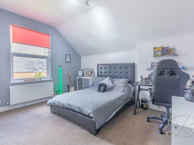All the bedrooms are beautifully presented, including this one, which faces the back of the property. Again, there is plenty of space for a desk and other furniture.
