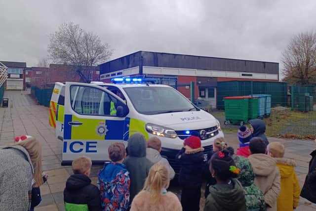 The pupils had the chance to turn on the emergency lights on the police van.